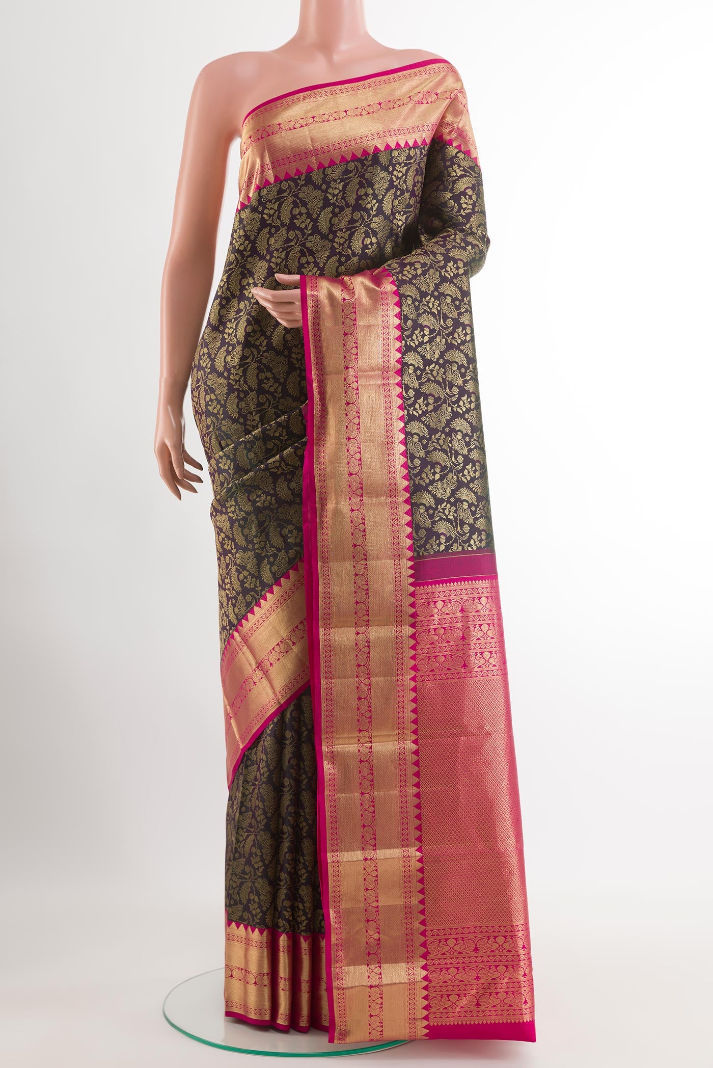 Black Kanjivaram Silk Saree with Zari Brocade on the body and Zari Border.  displayed on a mannequin
