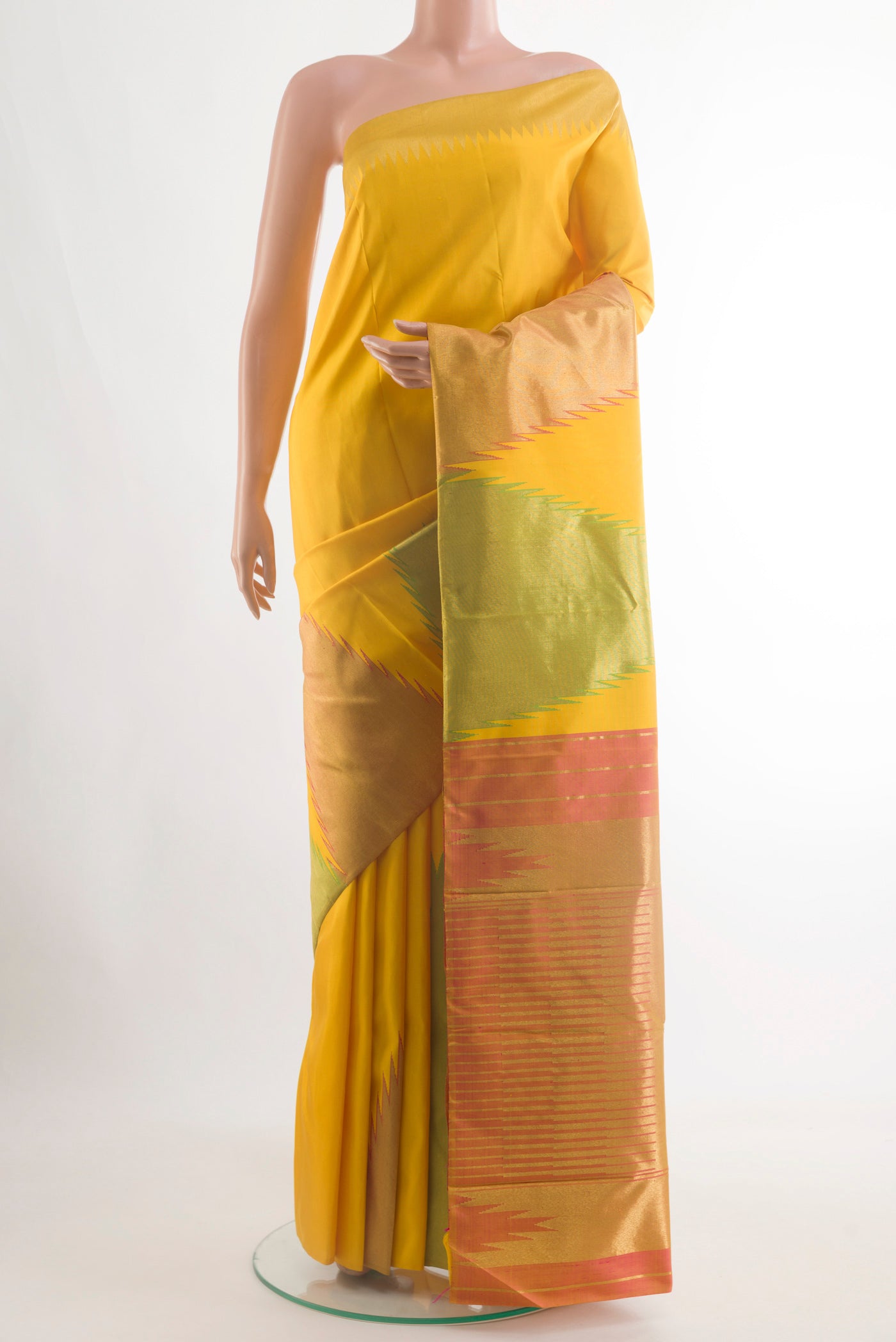 Pure Silk Pure Zari Yellow Kanjivaram Saree with Plain Body and Temple Border.  displayed on a mannequin