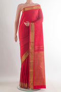 Pure Silk Pure Zari Red Kanchipuram Saree with Zari Butta on the body and Zari Border.  displayed on a mannequin