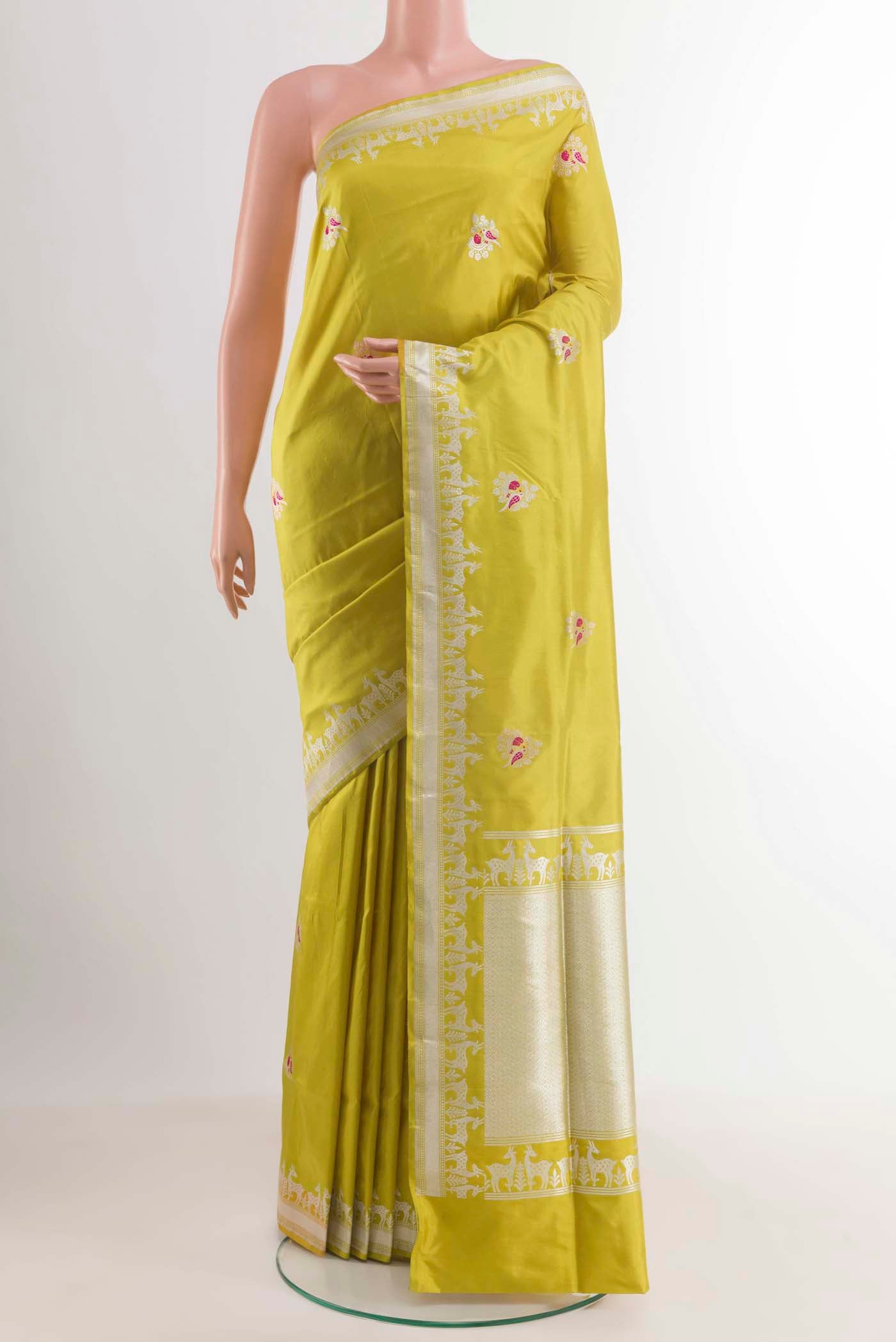 Yellow Banarasi Silk Saree with Zari Butta on the body and Zari Border displayed on a mannequin