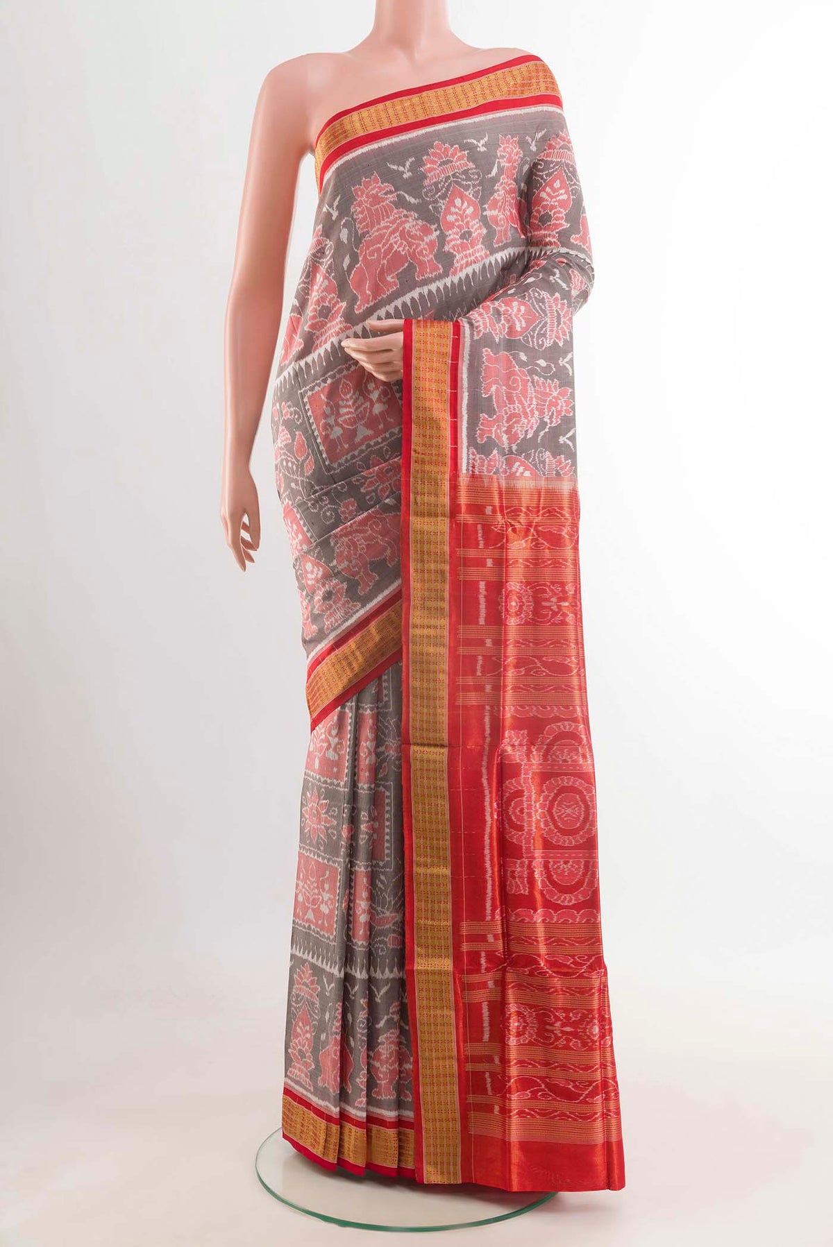 Grey Orissa Silk Saree with Ikat design on the body and Zari Border displayed on a mannequin