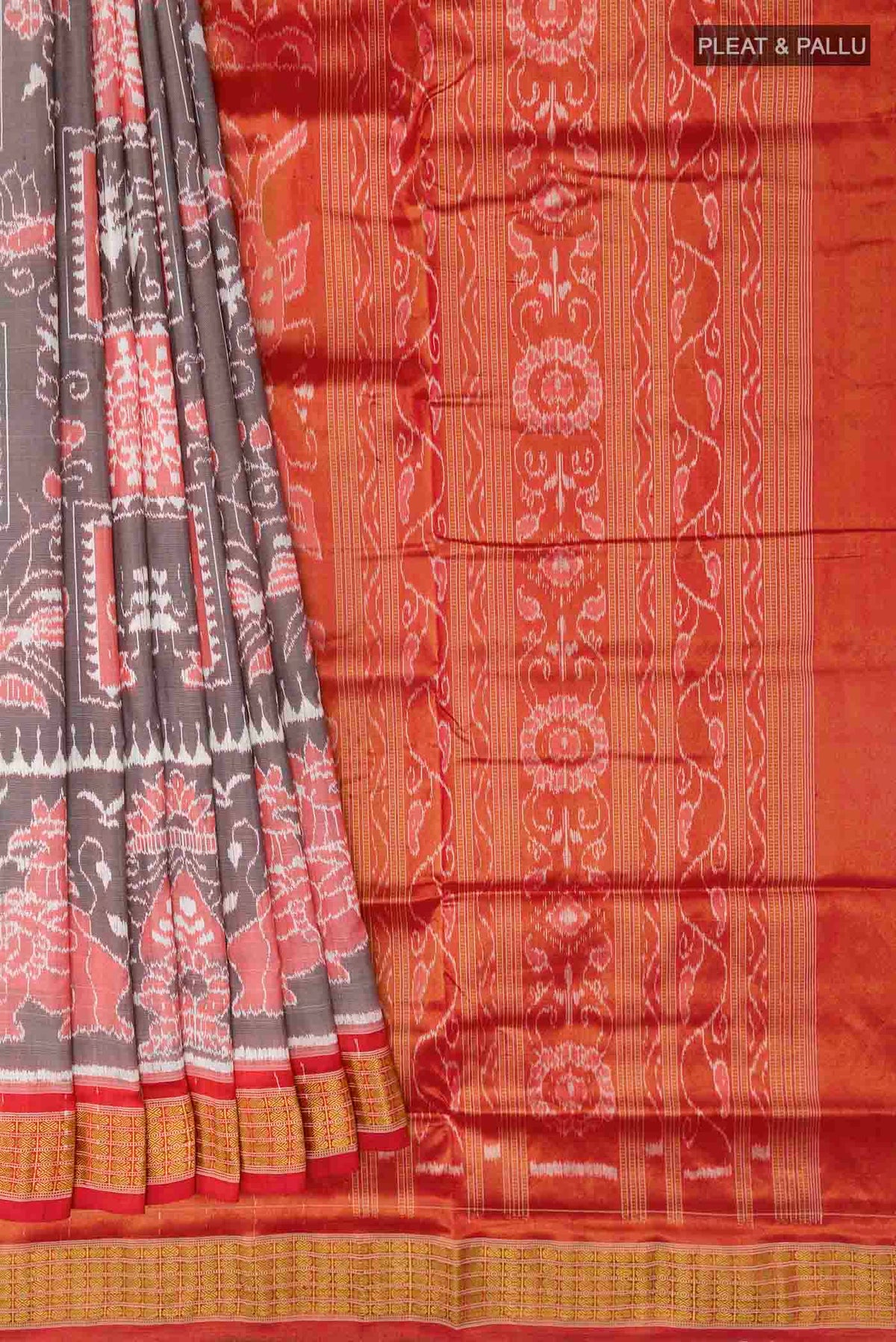 Pleats and pallu of Grey Orissa Silk Saree with Ikat design on the body and Zari Border
