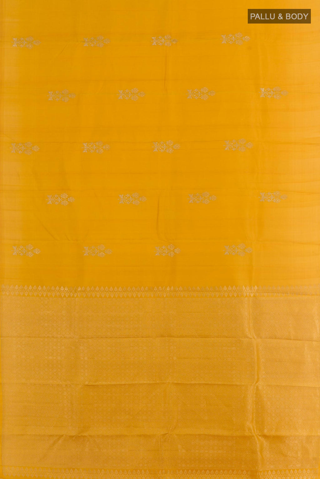 Flat view of Mustard Kanjivaram Silk Saree with Zari Butta on the body and Without Border. 