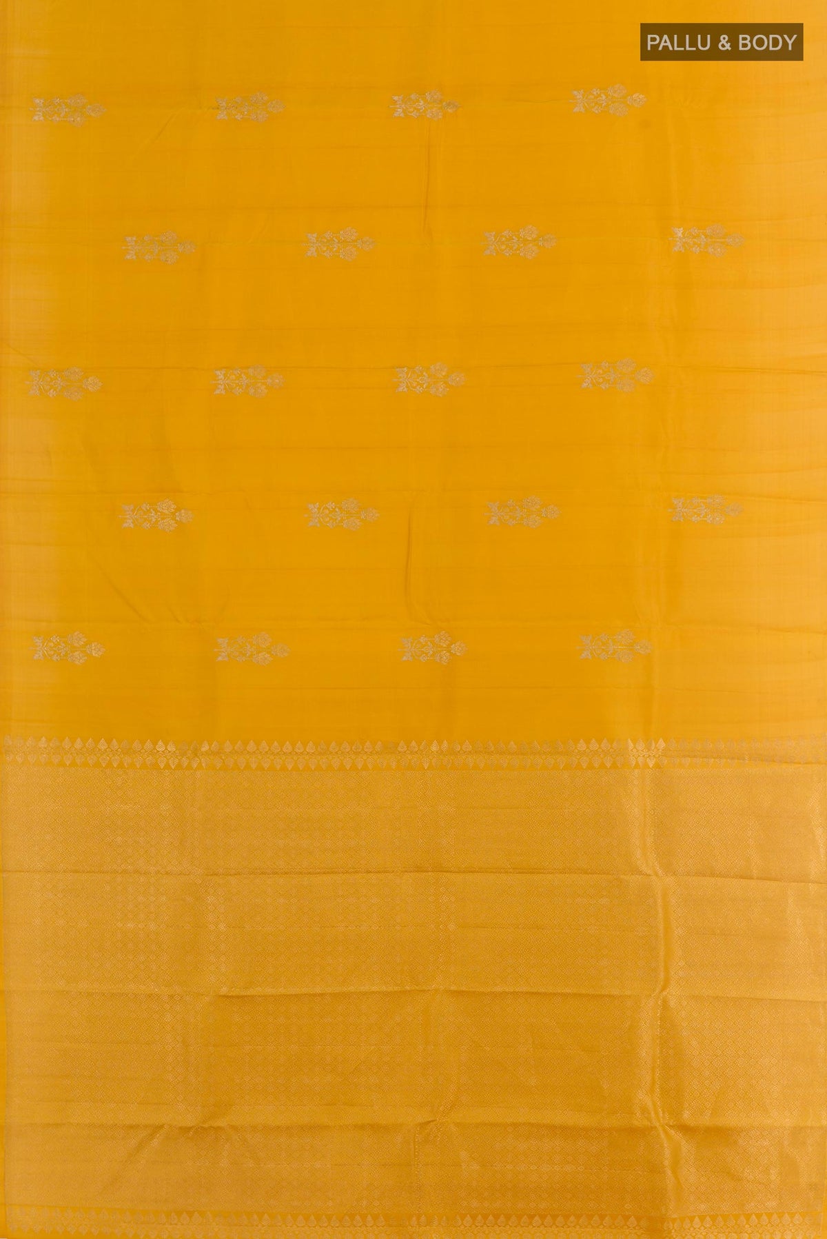 Flat view of Mustard Kanjivaram Silk Saree with Zari Butta on the body and Without Border. 