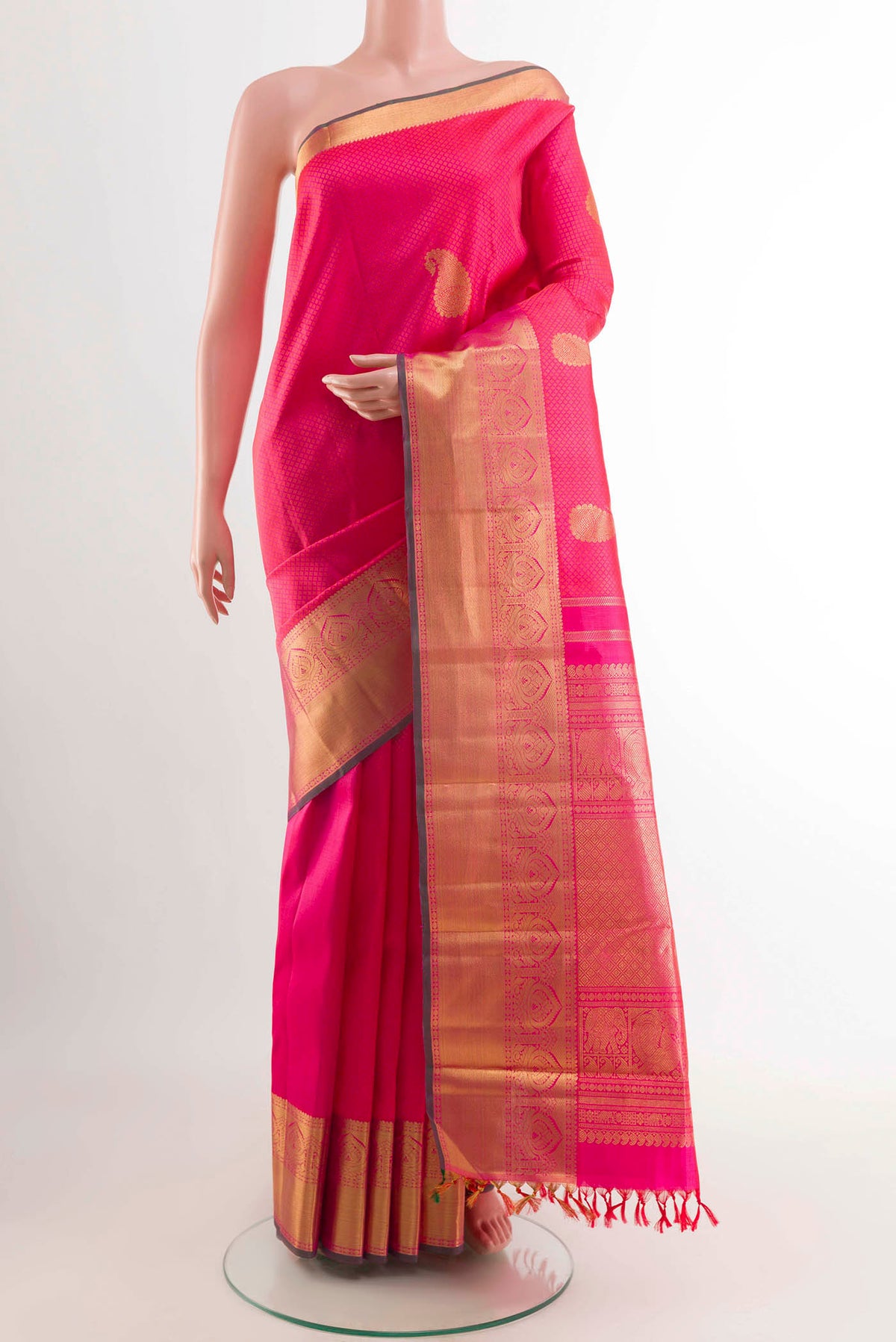 Pink Kanchipuram Silk Saree with Jacquard With Zari Butta on the body and Zari Border displayed on a mannequin