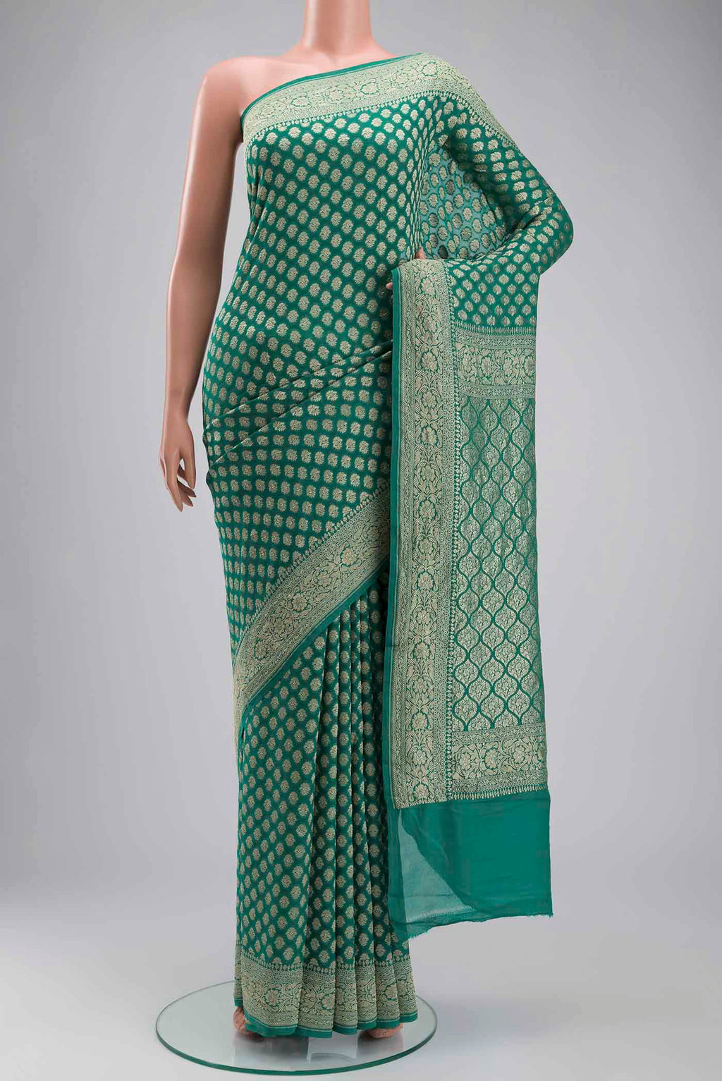 Green Banarasi Georgette Saree with Zari Butta on the body and Zari Border displayed on a mannequin