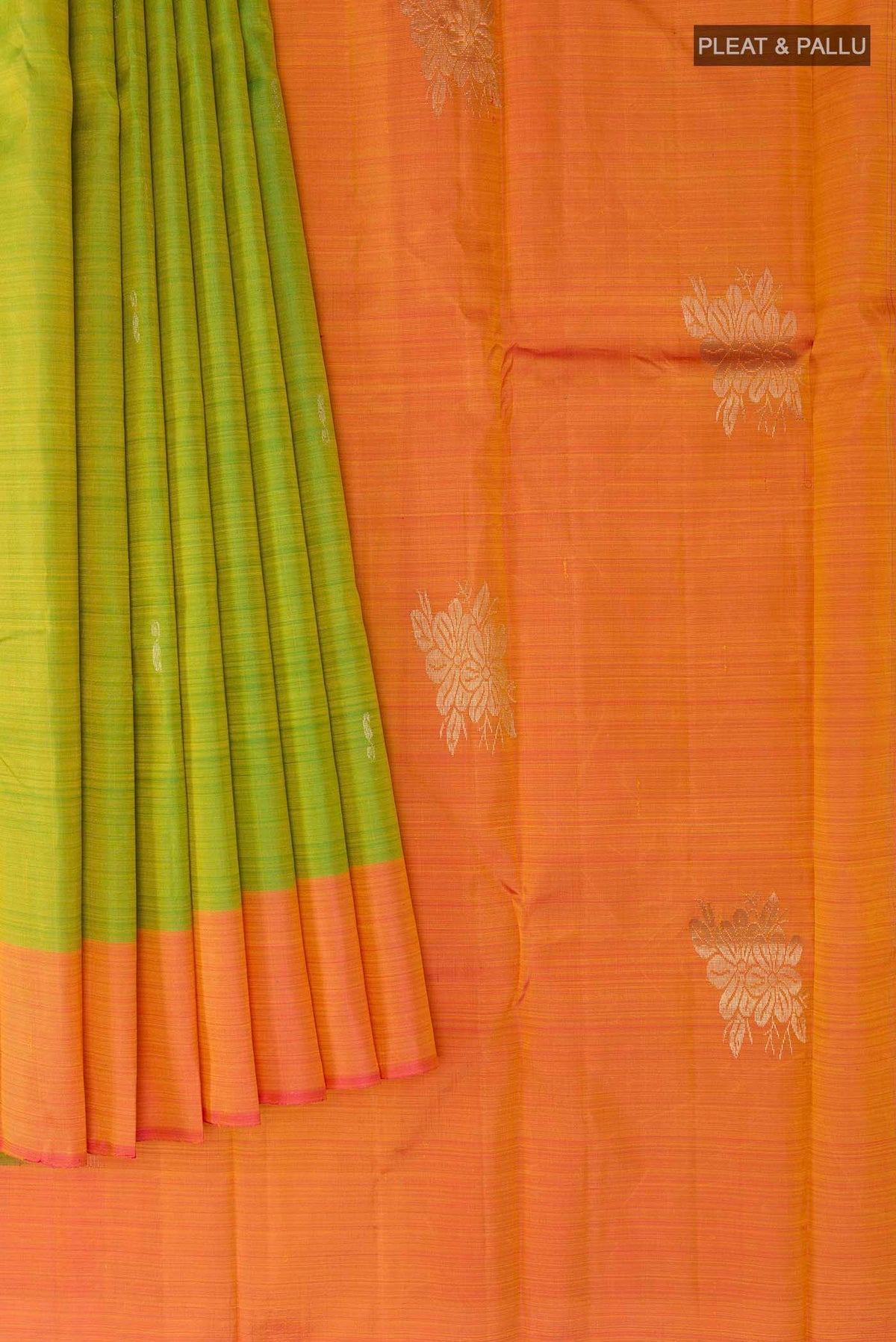 Pleats and pallu of Green Kanchipuram Silk Saree with Zari Butta on the body and Zari Border