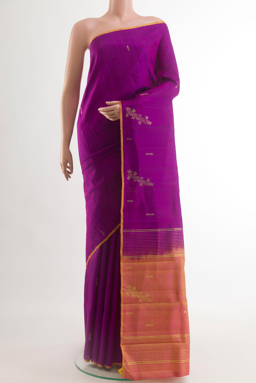 Purple Kanchipuram Silk Saree with Zari Butta on the body and Zari Border.  displayed on a mannequin