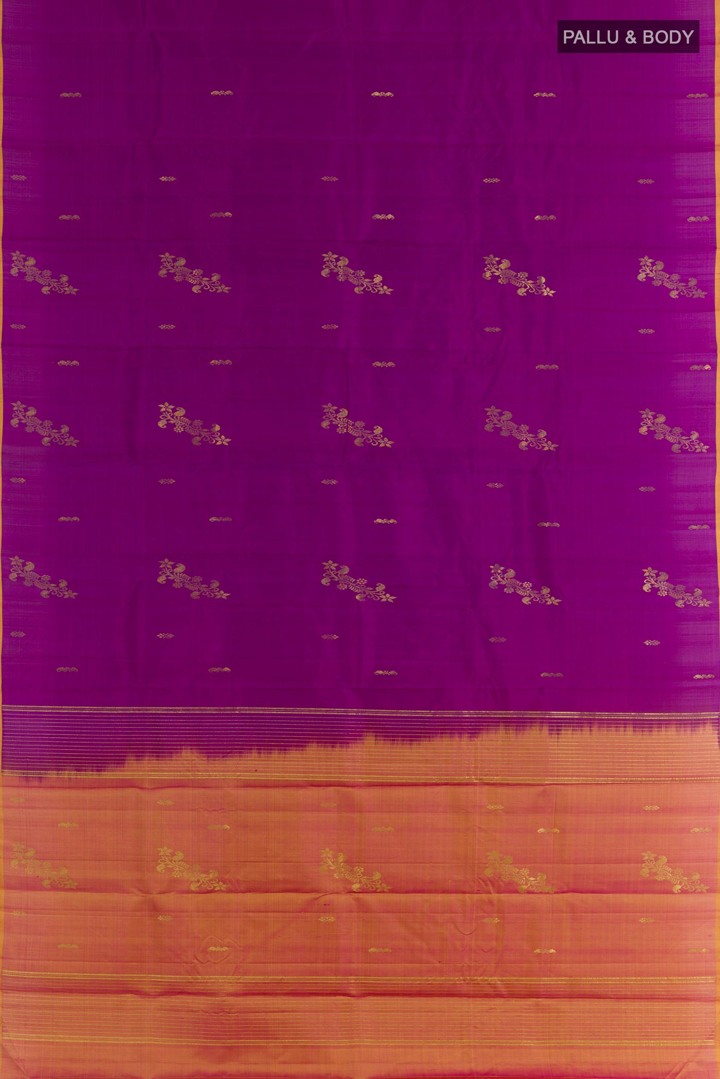 Flat view of Purple Kanchipuram Silk Saree with Zari Butta on the body and Zari Border. 