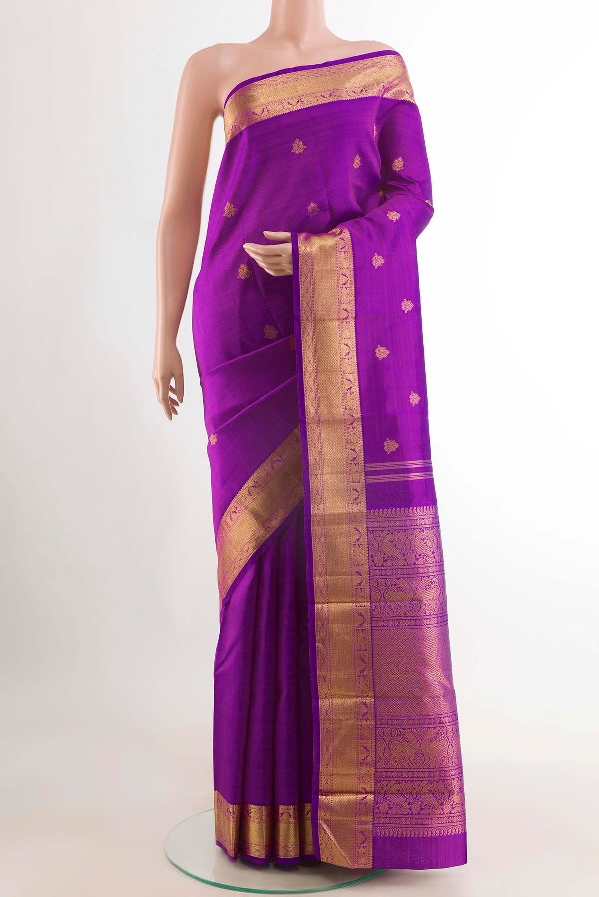 Purple Kanchipuram Silk Saree with Zari Butta on the body and Zari Border displayed on a mannequin