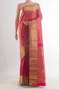 Pure Silk Pure Zari Pink Kanjivaram Saree with Zari Brocade on the body and Zari Border.  displayed on a mannequin