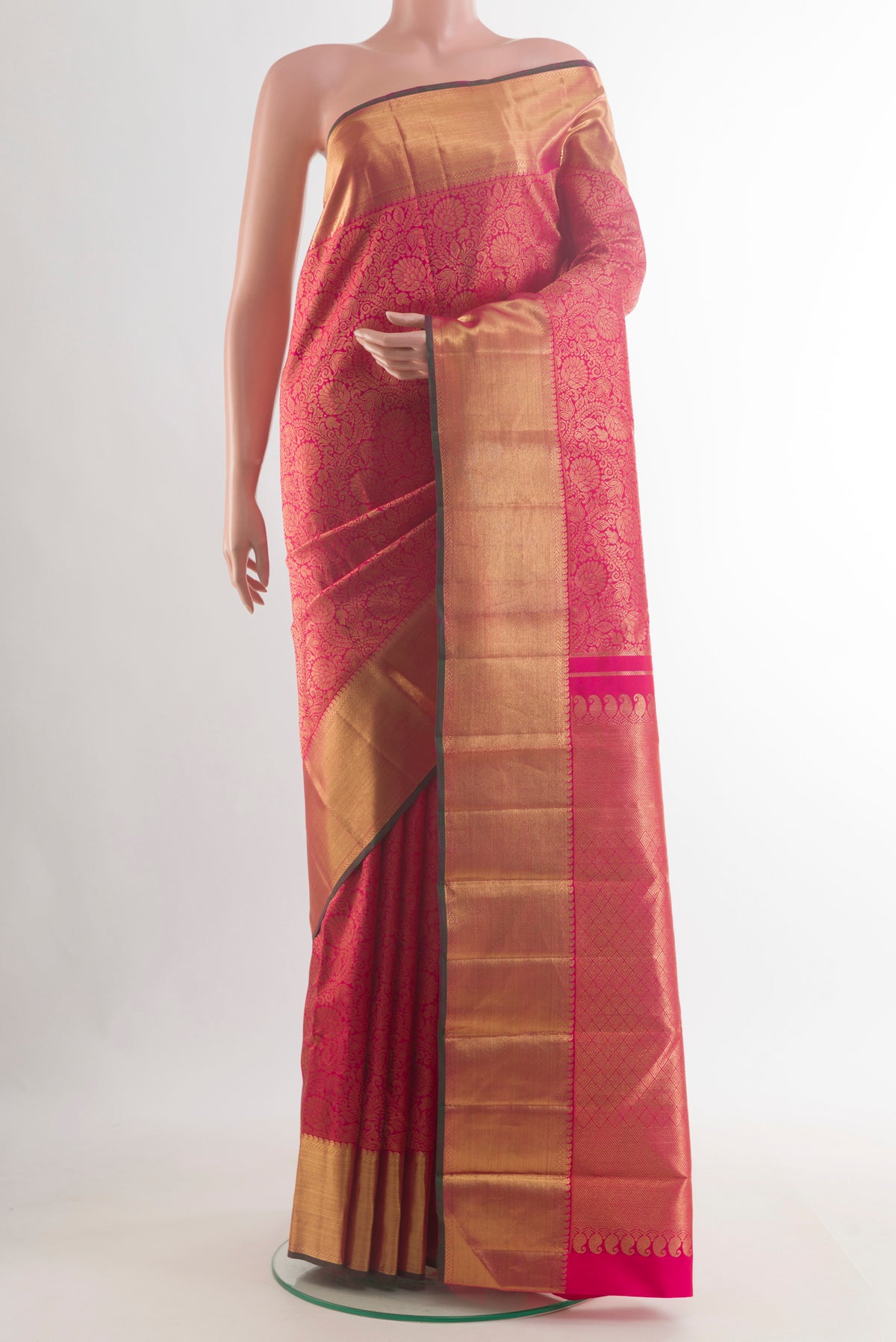 Pure Silk Pure Zari Pink Kanjivaram Saree with Zari Brocade on the body and Zari Border.  displayed on a mannequin