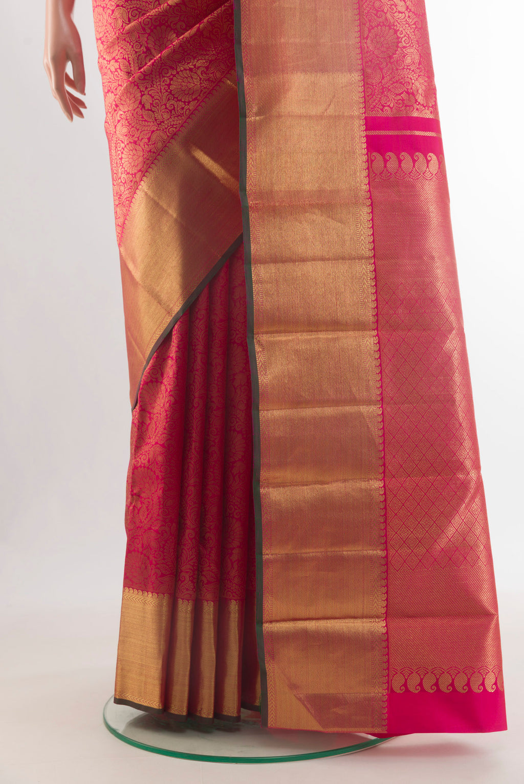 Pleats and pallu of Pure Silk Pure Zari Pink Kanjivaram Saree with Zari Brocade on the body and Zari Border. 