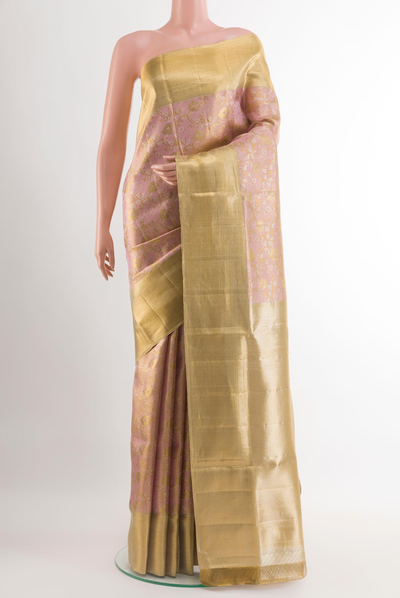 Pink Kanjivaram Tissue Silk Saree with Zari Brocade on the body and Zari Border.  displayed on a mannequin