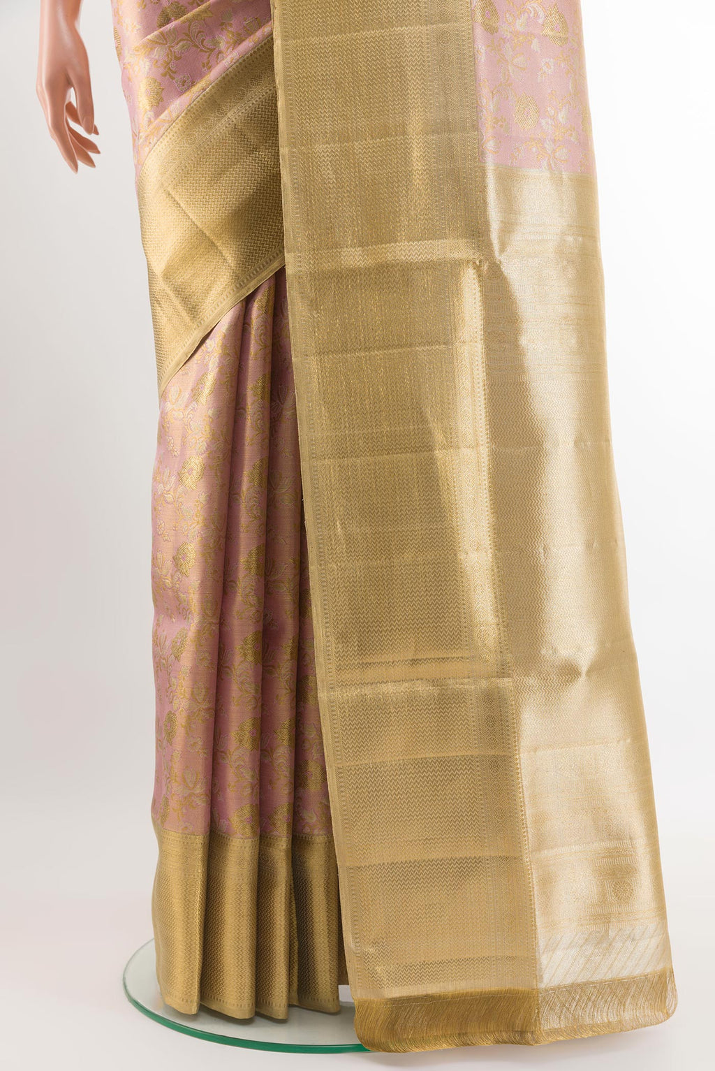 Pleats and pallu of Pink Kanjivaram Tissue Silk Saree with Zari Brocade on the body and Zari Border. 