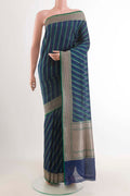 Blue Banarasi Silk Saree with Stripes on the body and Zari Border displayed on a mannequin