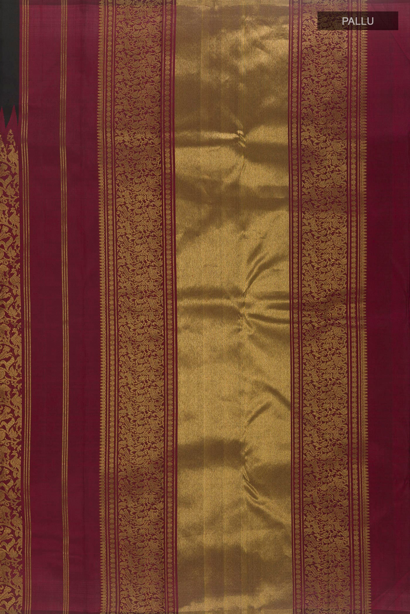 Close up image of the pallu of Black Kanchipuram Silk Saree with Plain Body and Zari Border. 