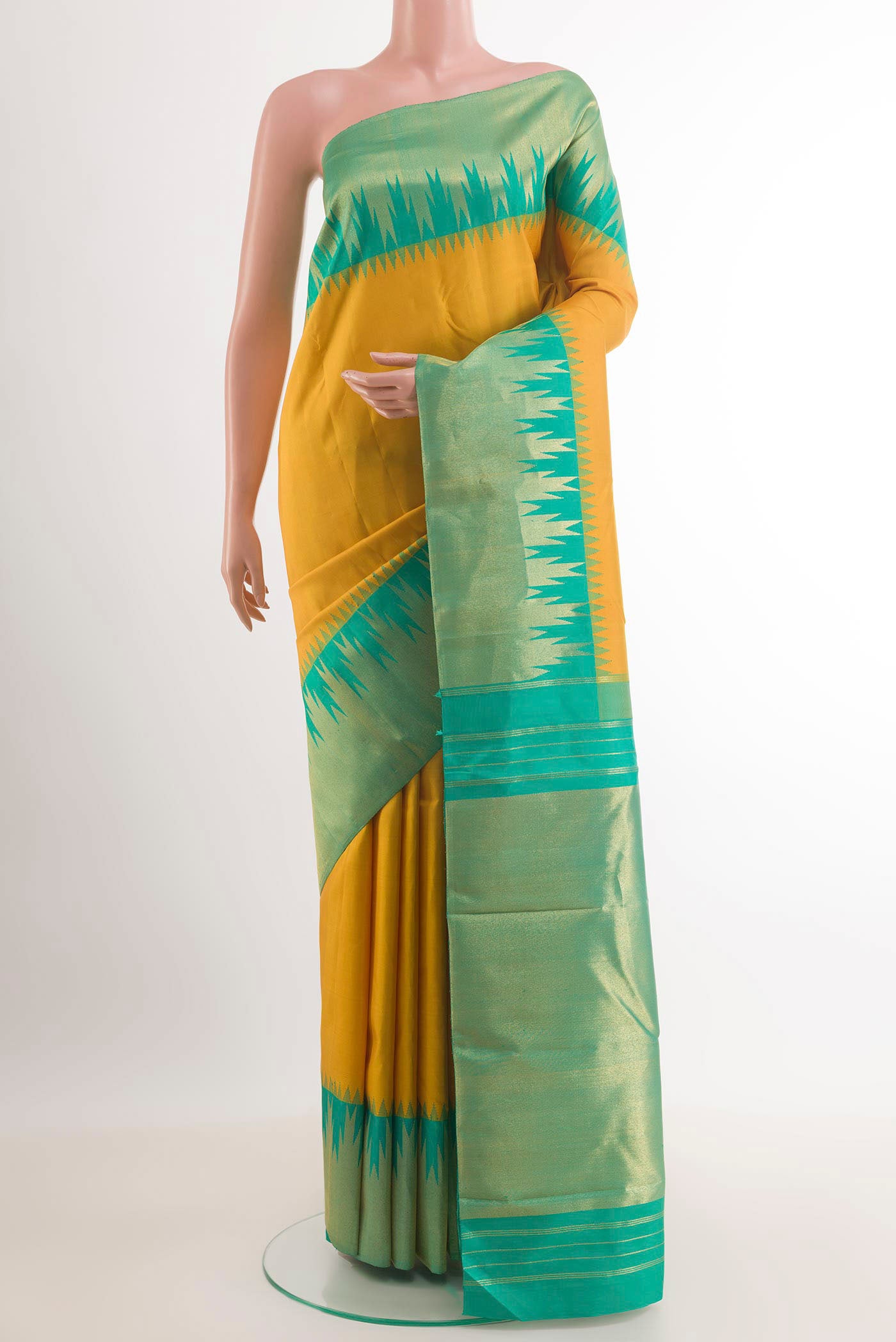 Yellow Kanjivaram Silk Saree with Plain Body and Temple Border.  displayed on a mannequin