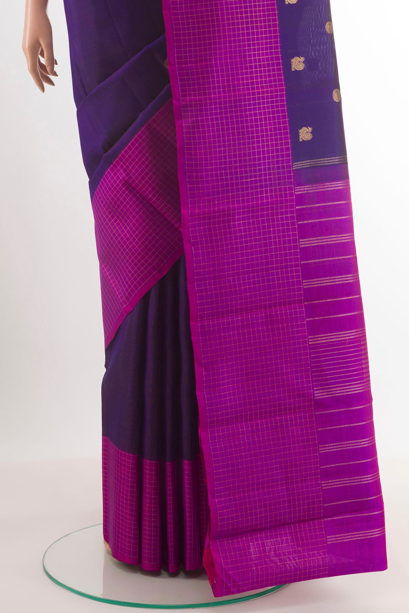 Pleats and pallu of Purple Kanjivaram Silk Saree with Zari Butta on the body and Zari Border. 