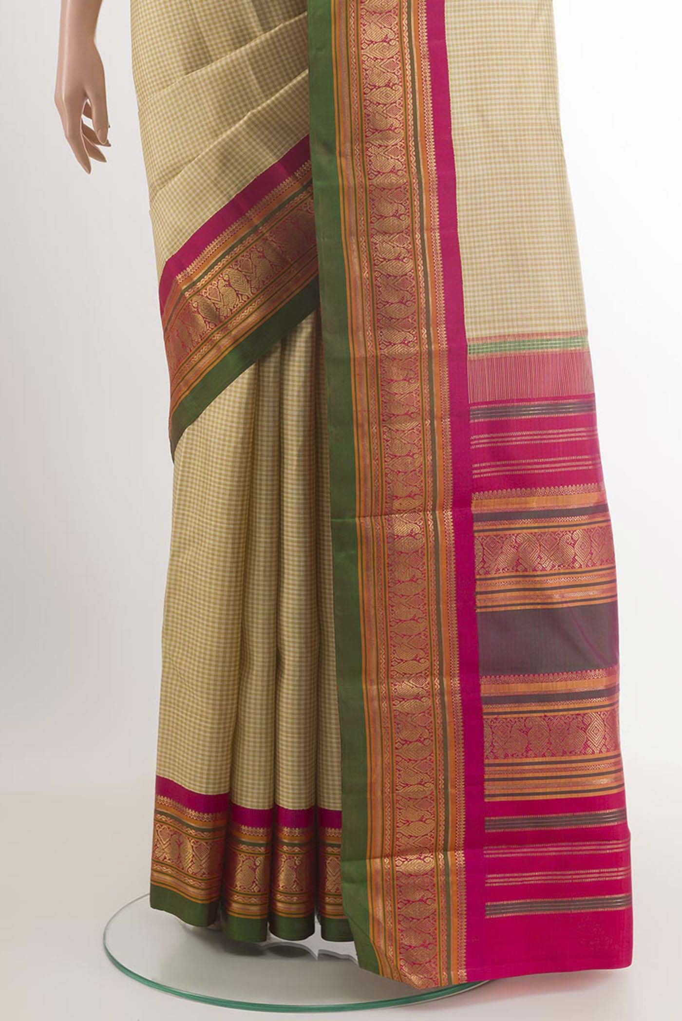 Pleats and pallu of Olive Green Kanjivaram Silk Saree with Checked design on the body and Ganga Jamuna Border. 