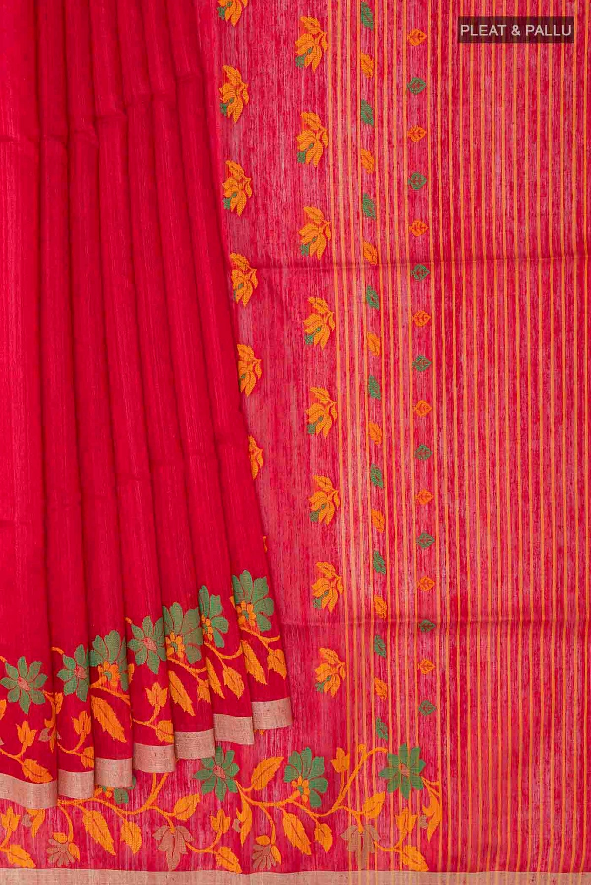 Pleats and pallu of Red Tussar Saree with Plain Body and Zari Border
