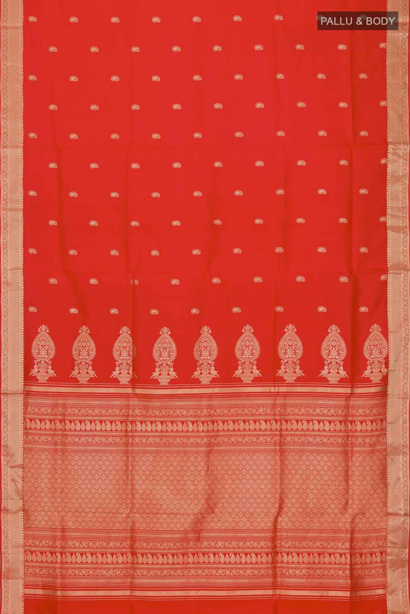 Flat view of Orange Soft Silk Saree with Zari Butta on the body and Zari Border