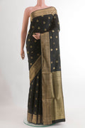 Black Soft Silk Saree with Jacquard With Zari Butta on the body and Zari Border.  displayed on a mannequin