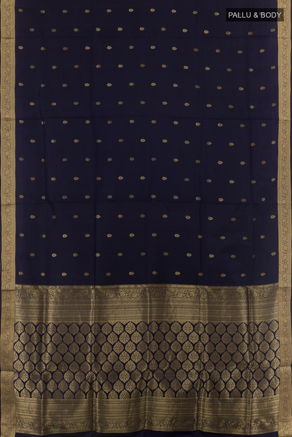 Flat view of Navy Blue Soft Silk Saree with Zari Butta on the body and Zari Border. 