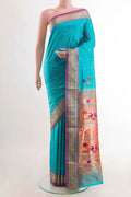 Blue Paithani Silk Saree with Zari Butta on the body and Paithani Border displayed on a mannequin