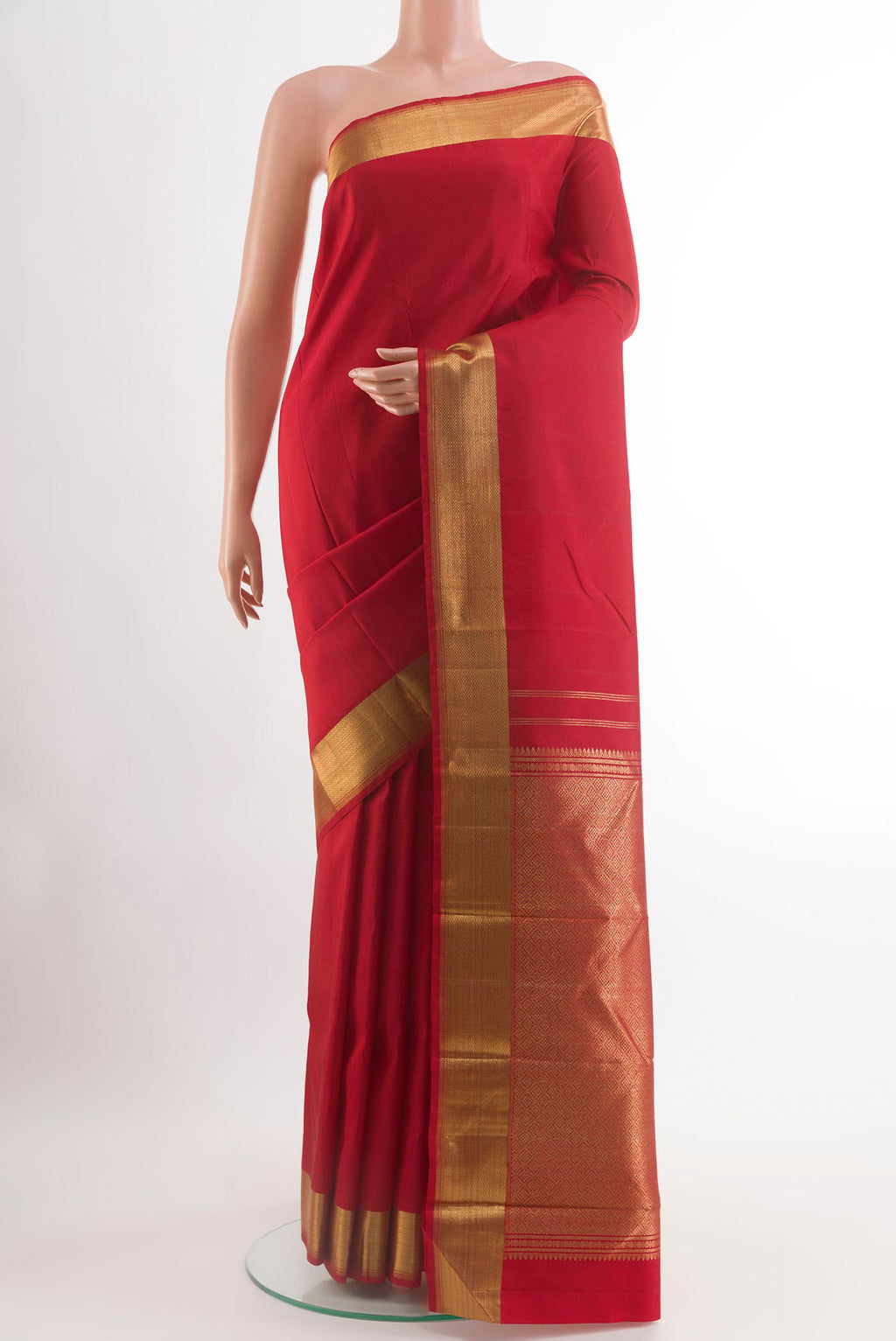 Red Kanchipuram Silk Saree with Plain Body and Zari Border.  displayed on a mannequin