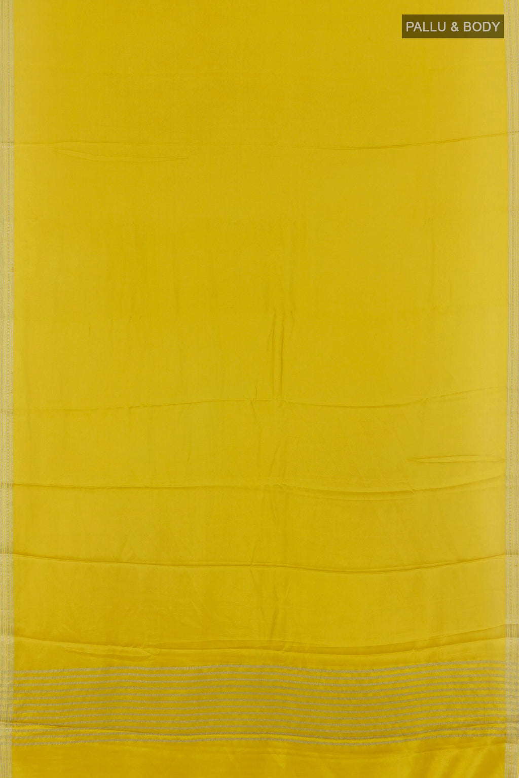 Flat view of Yellow Mysore Crepe Saree with Plain Body and Zari Border. 