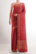Red Mysore Crepe Saree with Zari Brocade on the body and Zari Border.  displayed on a mannequin