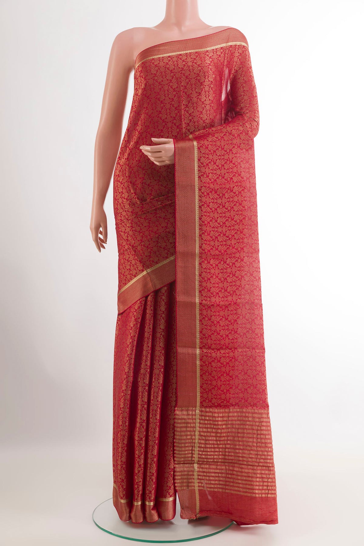 Red Mysore Crepe Saree with Zari Brocade on the body and Zari Border.  displayed on a mannequin