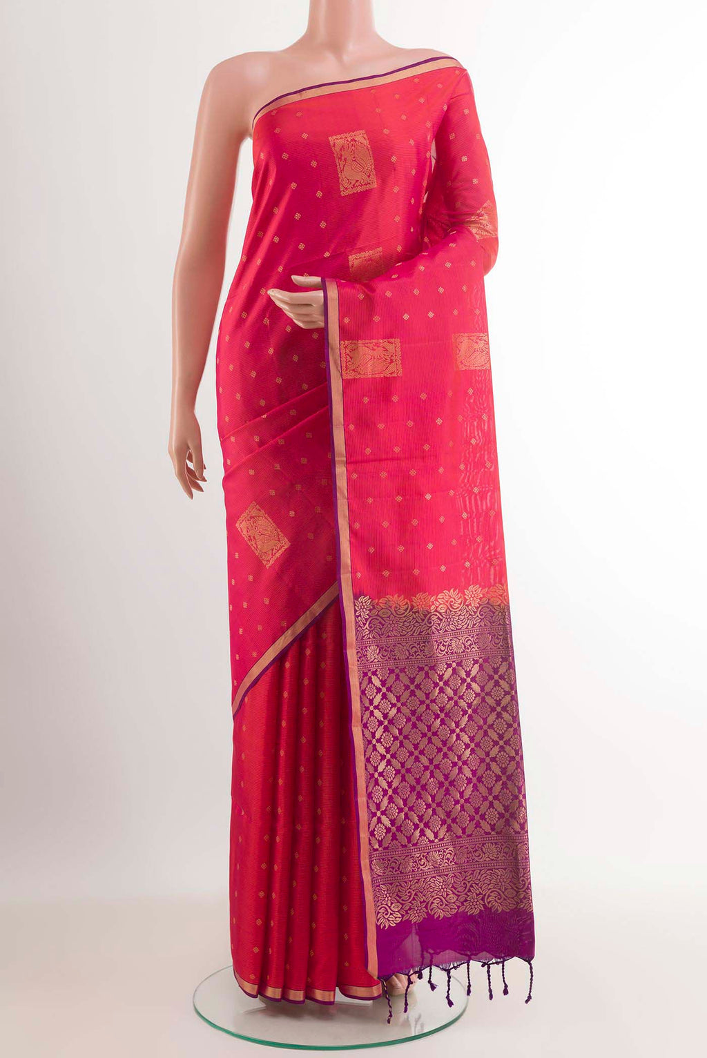 Pink Soft Silk Saree with Zari Butta on the body and Zari Border.  displayed on a mannequin