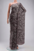 Grey Crepe Saree with Printed design on the body and Plain Border displayed on a mannequin