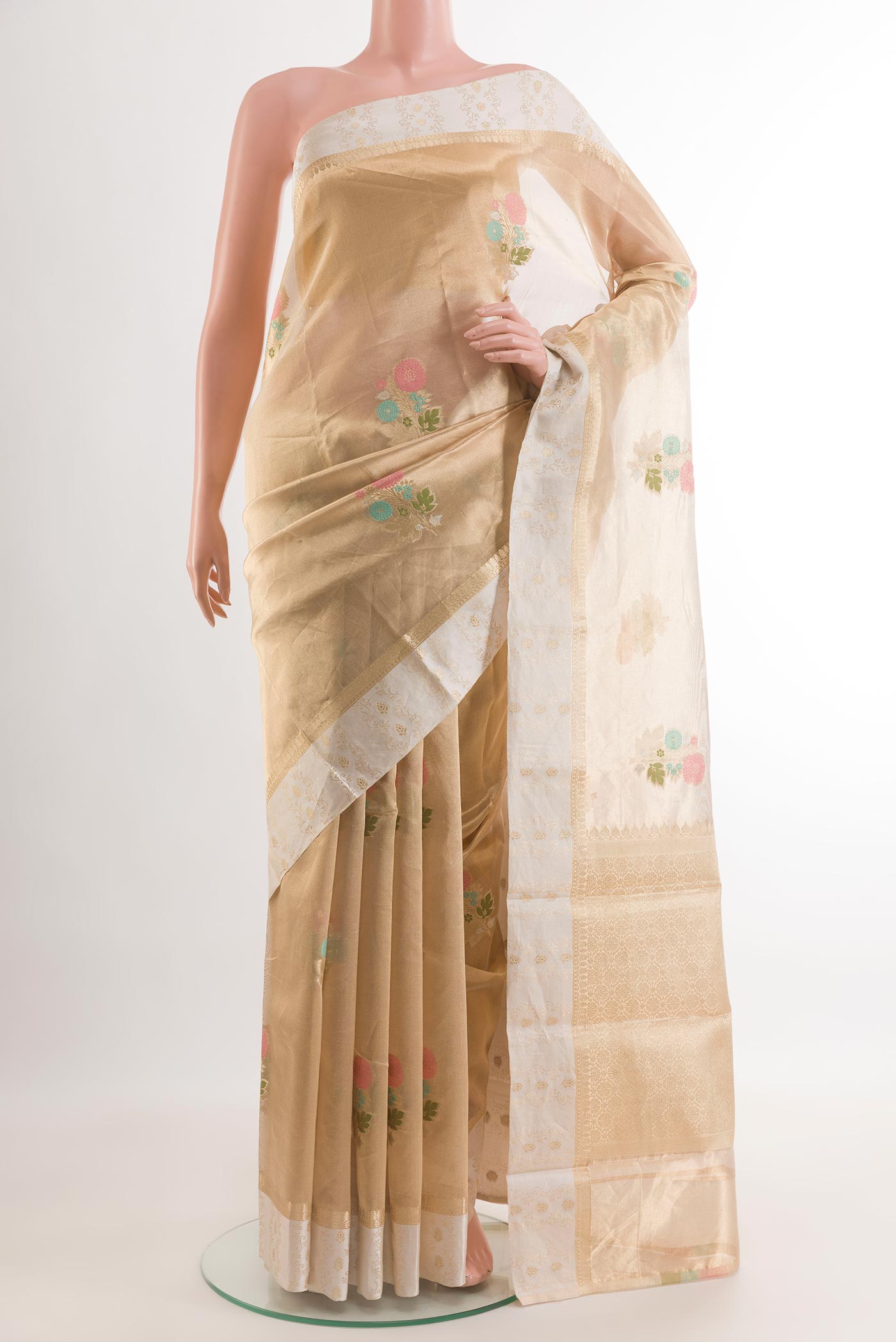 Beige Banarasi Kora Silk Saree with Thread Butta on the body and Zari Border.  displayed on a mannequin