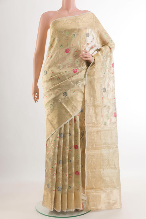 Beige Banarasi Kota Silk Saree with Zari And Thread Butta on the body and Zari Border.  displayed on a mannequin