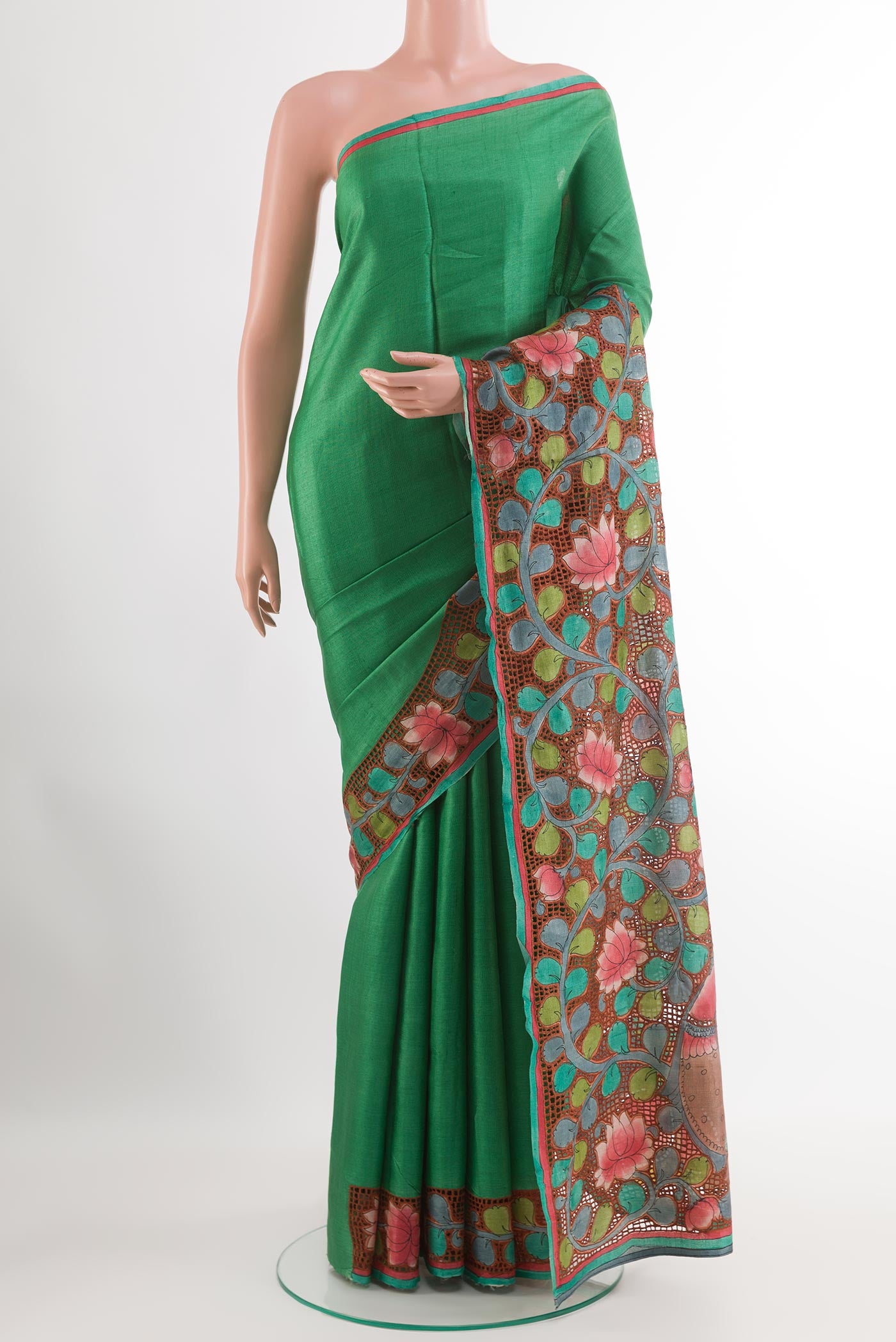 Green Tussar Saree with Plain Body and Plain Border.  displayed on a mannequin