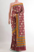 Magenta Tussar Saree with Printed design on the body and Plain Border.  displayed on a mannequin