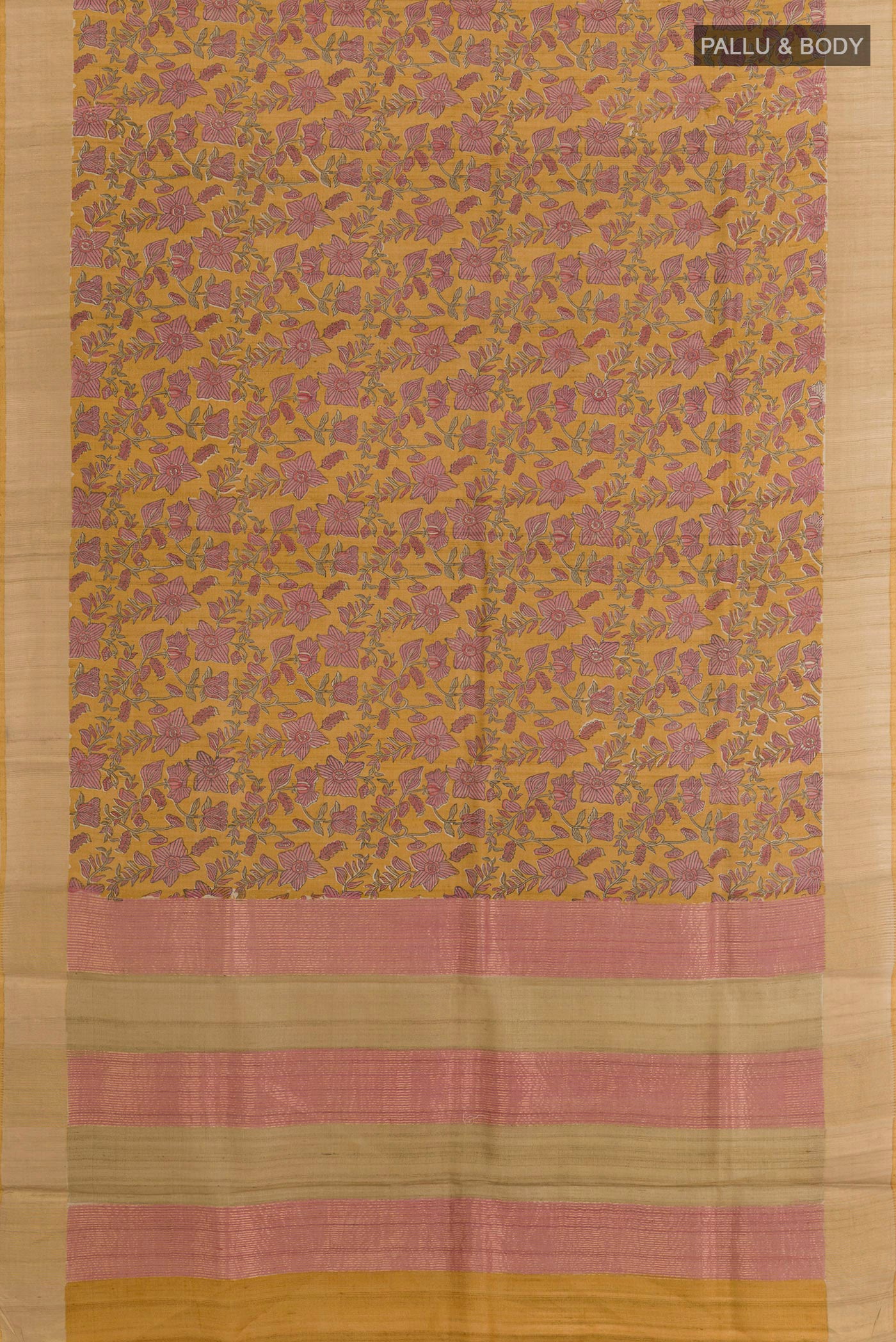 Flat view of Yellow Tussar Saree with Printed design on the body and Zari Border. 