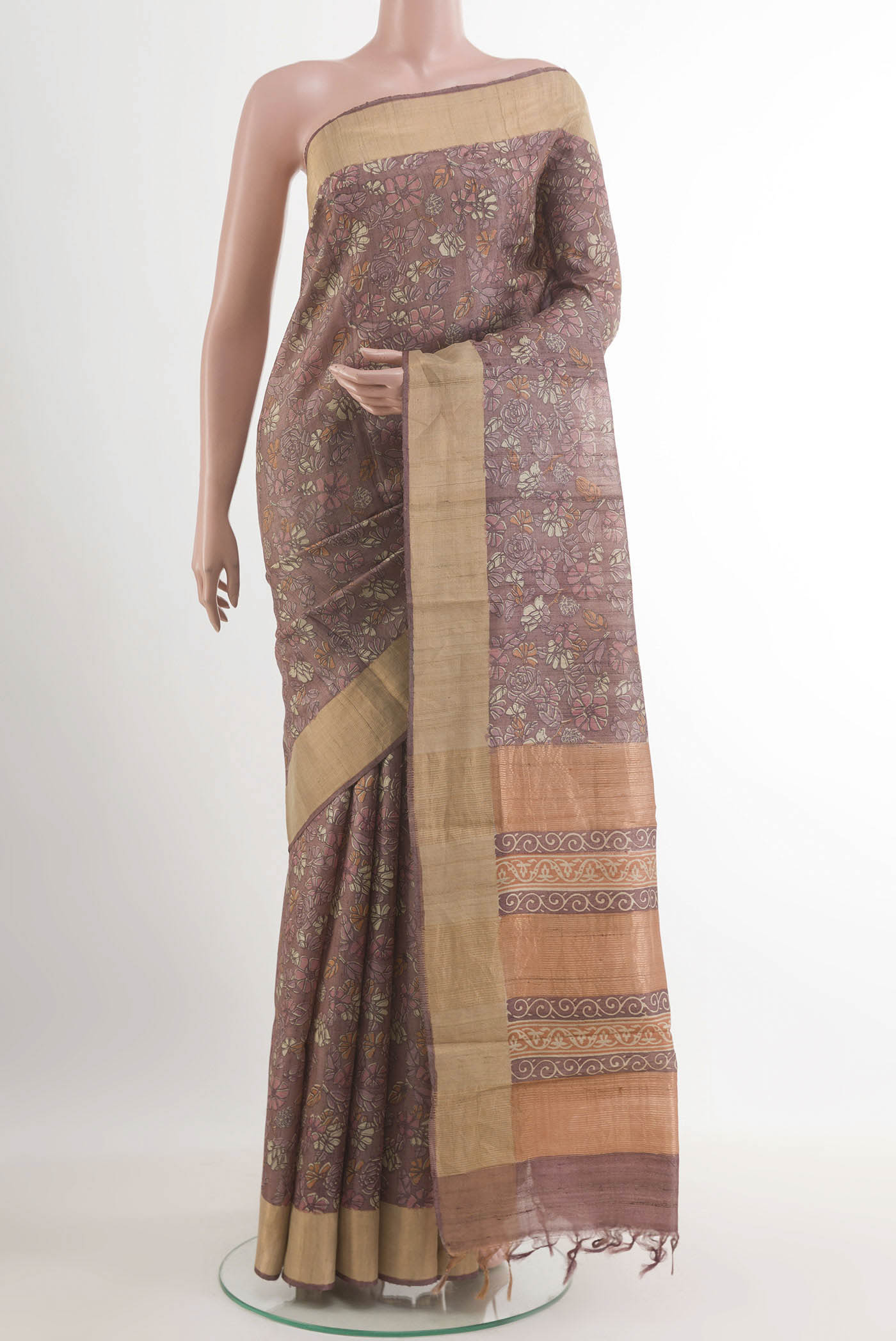 Pure Silk Pure Zari Purple Tussar Saree with Printed design on the body and Zari Border.  displayed on a mannequin