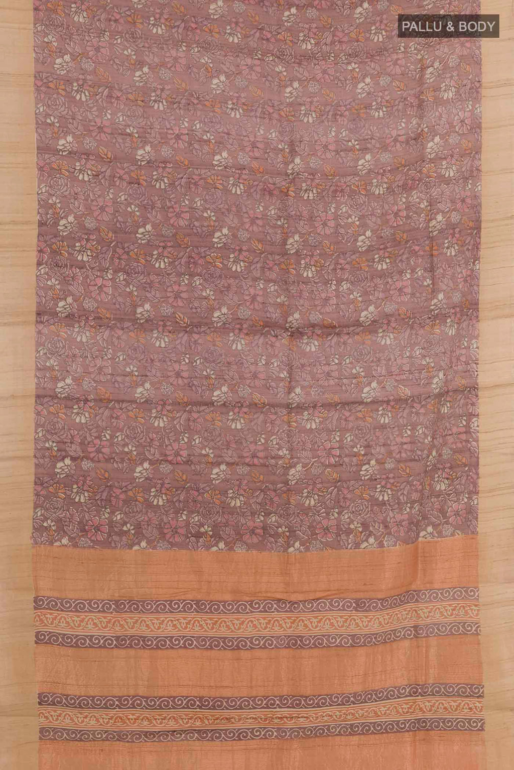 Flat view of Pure Silk Pure Zari Purple Tussar Saree with Printed design on the body and Zari Border. 