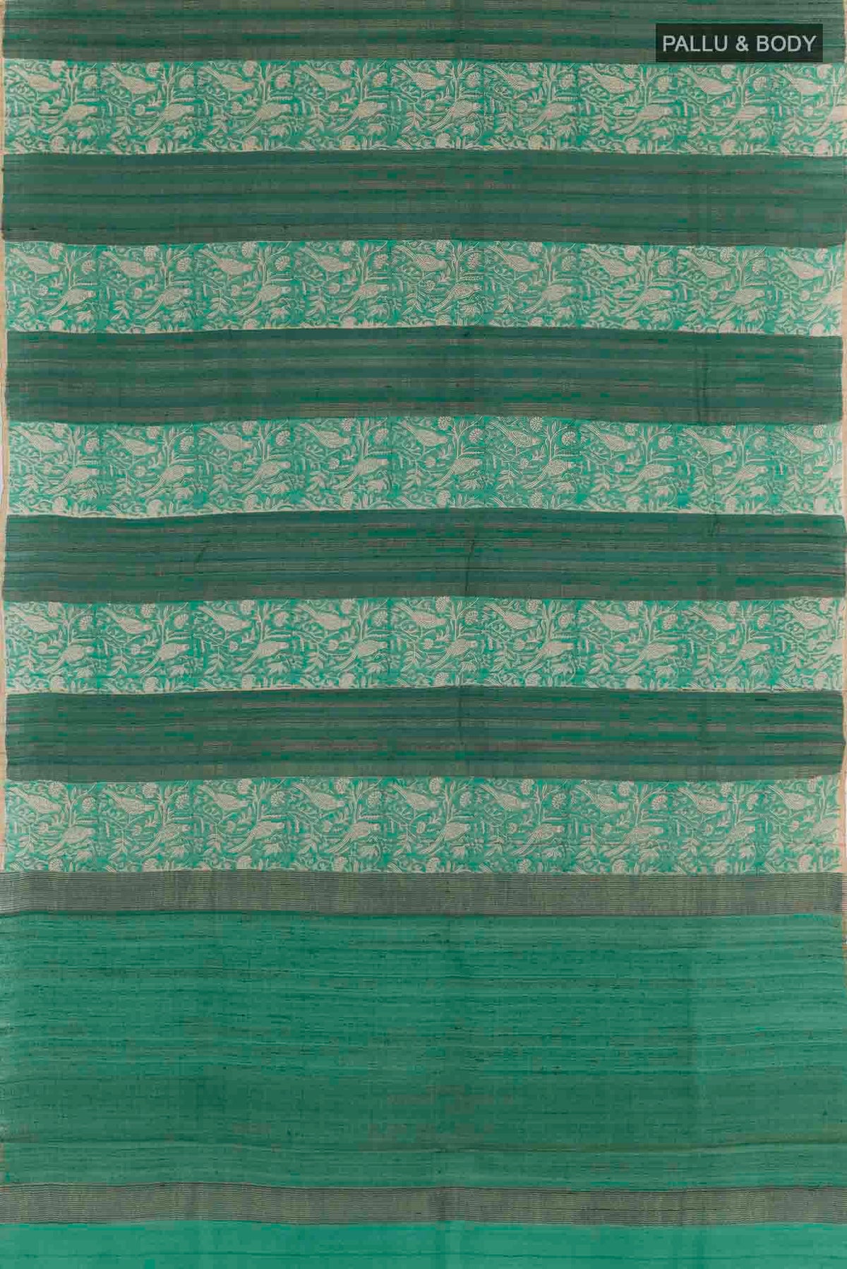 Flat view of Sea Green Tussar Saree with Printed design on the body and Zari Border