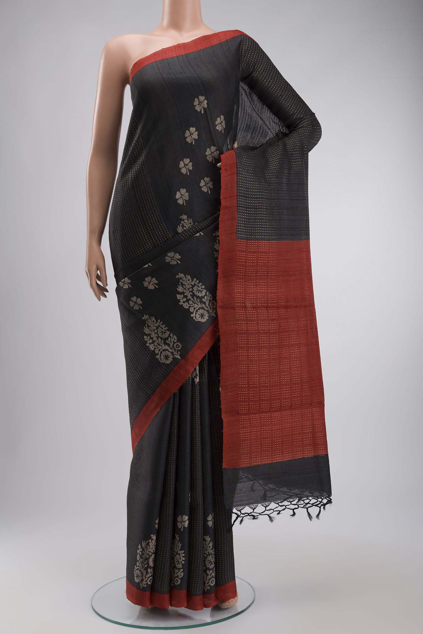 Black Bhagalpuri Tussar Silk Saree with Printed design on the body and Plain Border displayed on a mannequin