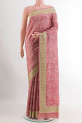 Pink Tussar Saree with Printed design on the body and Thread Embroidery Border.  displayed on a mannequin