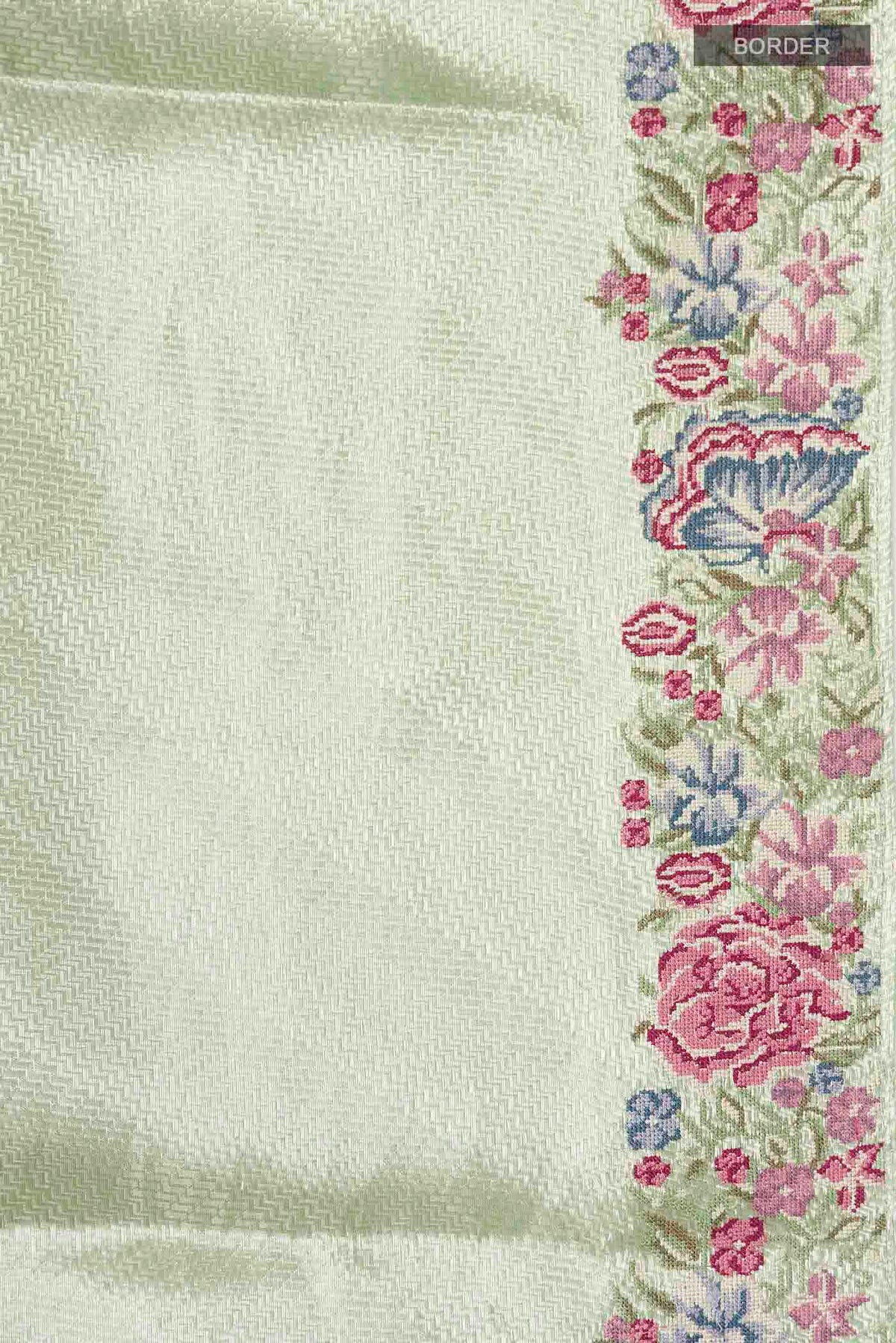 Border image of Mint Green Tissue Silk Saree with Zari Brocade on the body and Embroidery Border
