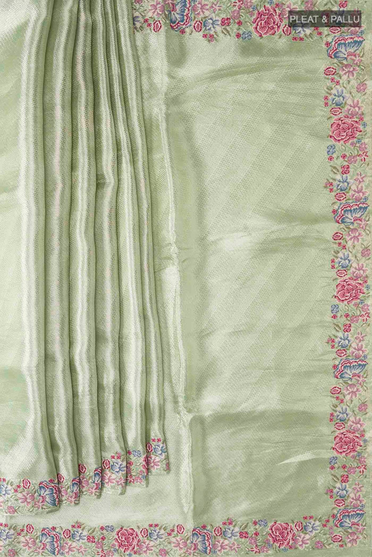 Pleats and pallu of Mint Green Tissue Silk Saree with Zari Brocade on the body and Embroidery Border