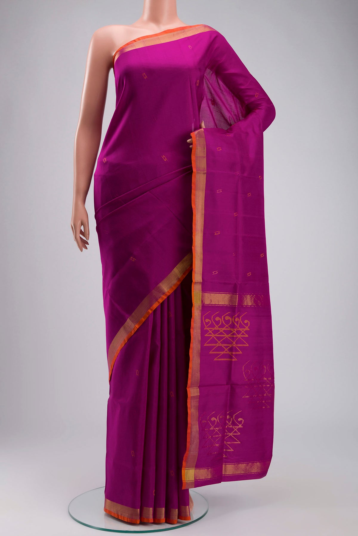 Magenta Uppada Silk Saree with Thread Butta on the body and Zari Border displayed on a mannequin