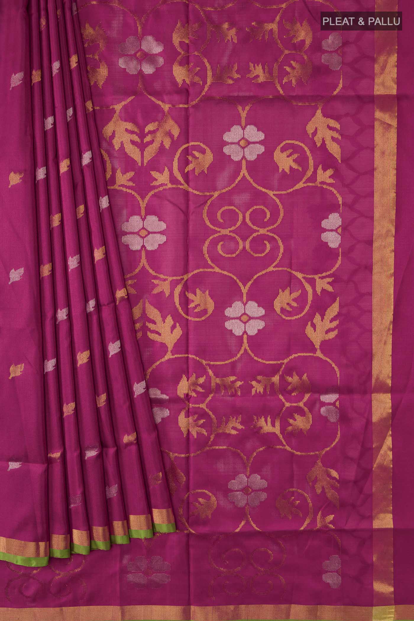 Pleats and pallu of Pink Uppada Silk Saree with Zari Butta on the body and Zari Border