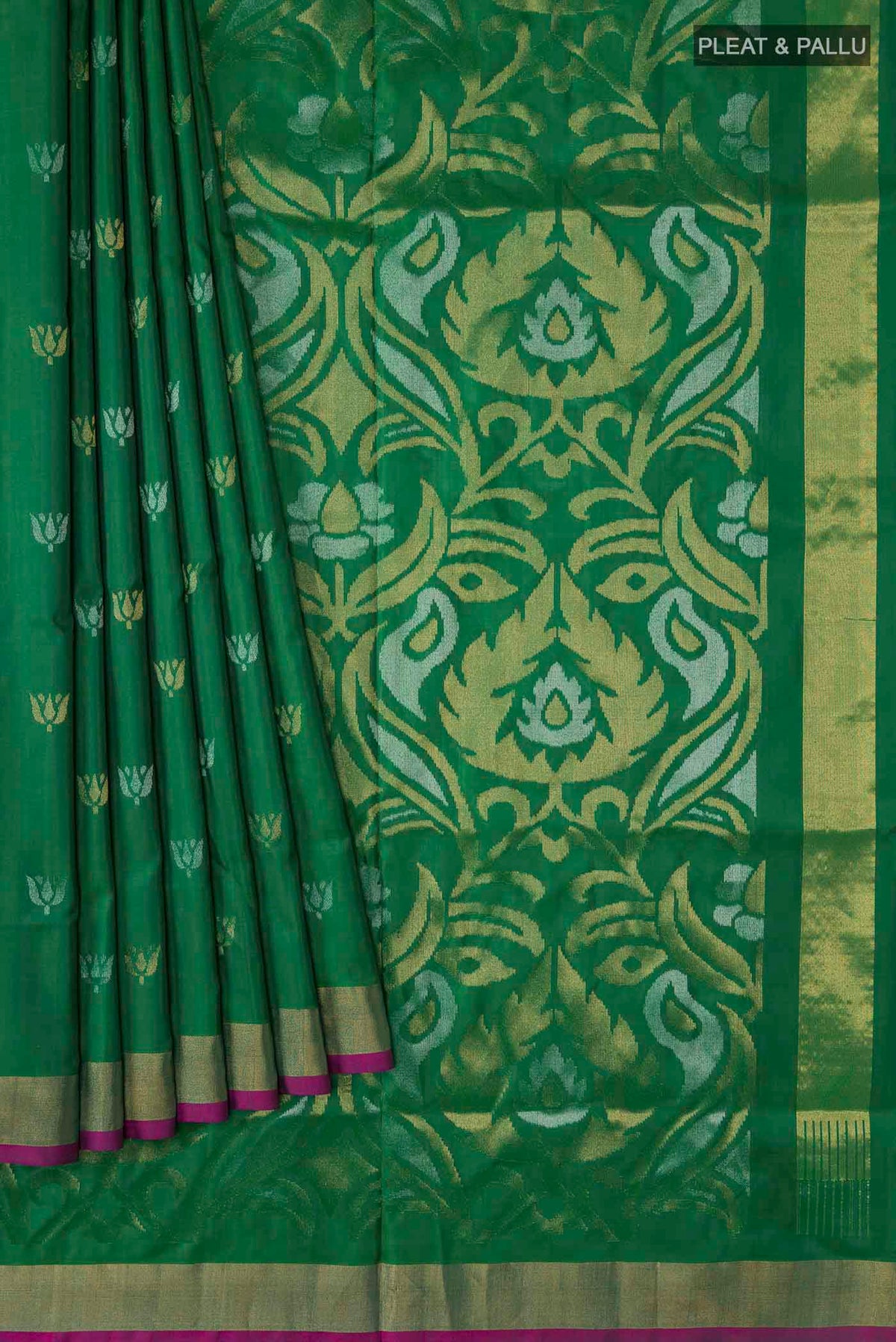 Pleats and pallu of Green Uppada Silk Saree with Zari Butta on the body and Zari Border